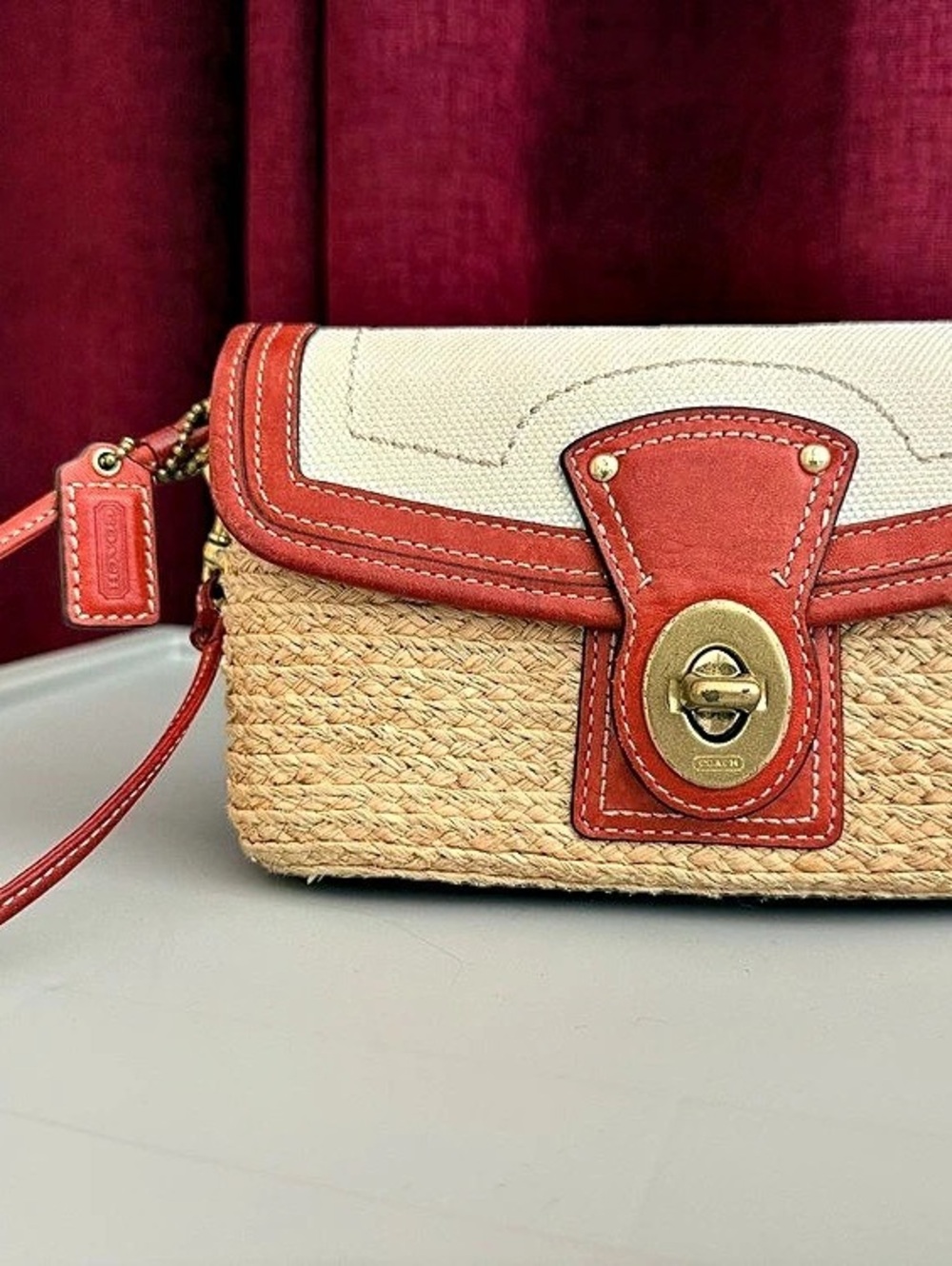 Coach Woven turnkock wristlet in Red /orange & Cream